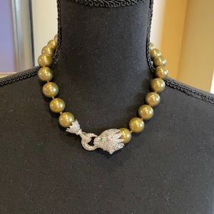Gold ball necklace with lion diamond clasp